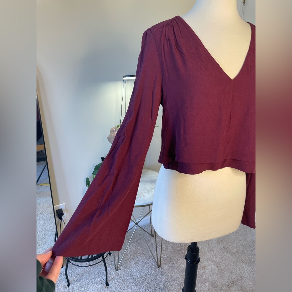 Free People Deep V Bell Sleeve Cropped Blouse in Wine Size S